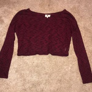 long sleeve maroon and black crop top